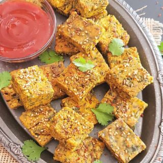 Close up image of kothimbir vadi which is Indian savory cilantro fritters made in Instant Pot and Air Fryer.