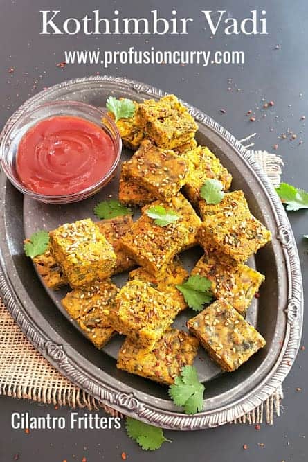 Pinterest image with text overlay for kothimbir vadi which is Indian cilantro fritters recipe.