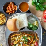 Pinterest image with text overlay for Indian Spicy breakfast curry recipe misal pav.