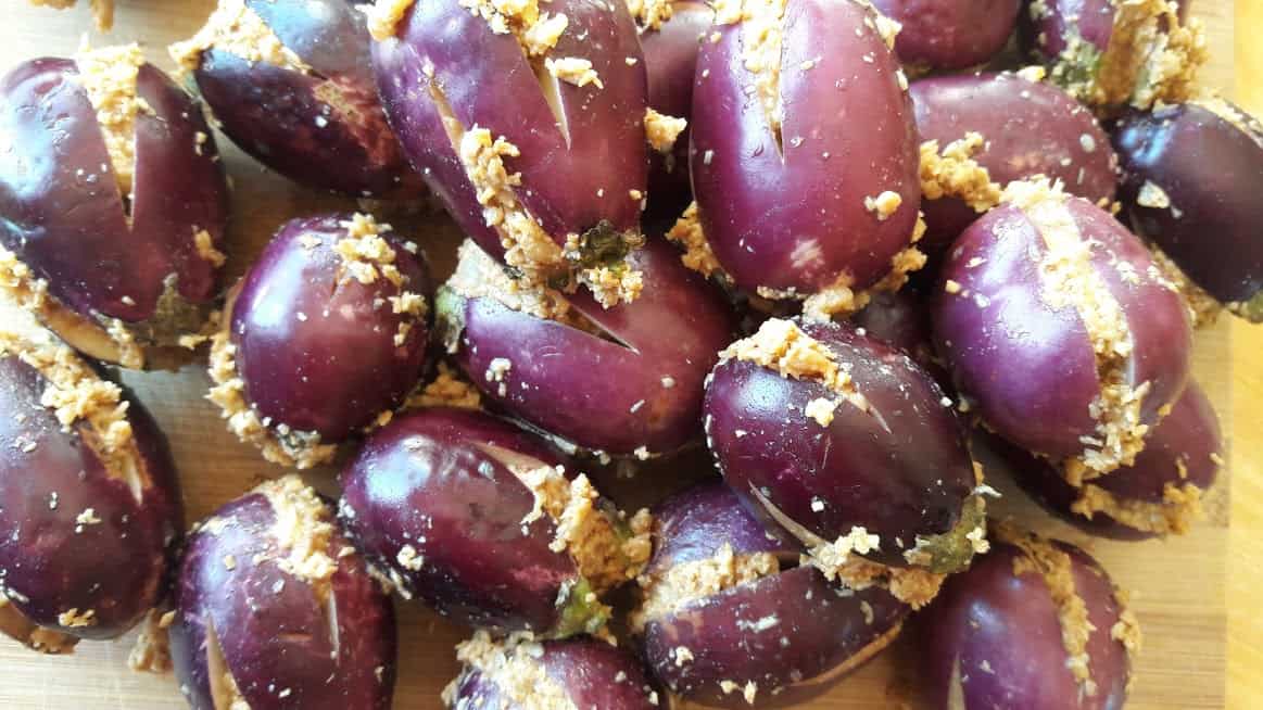 Stuffed eggplants stacked in Instant Pot.