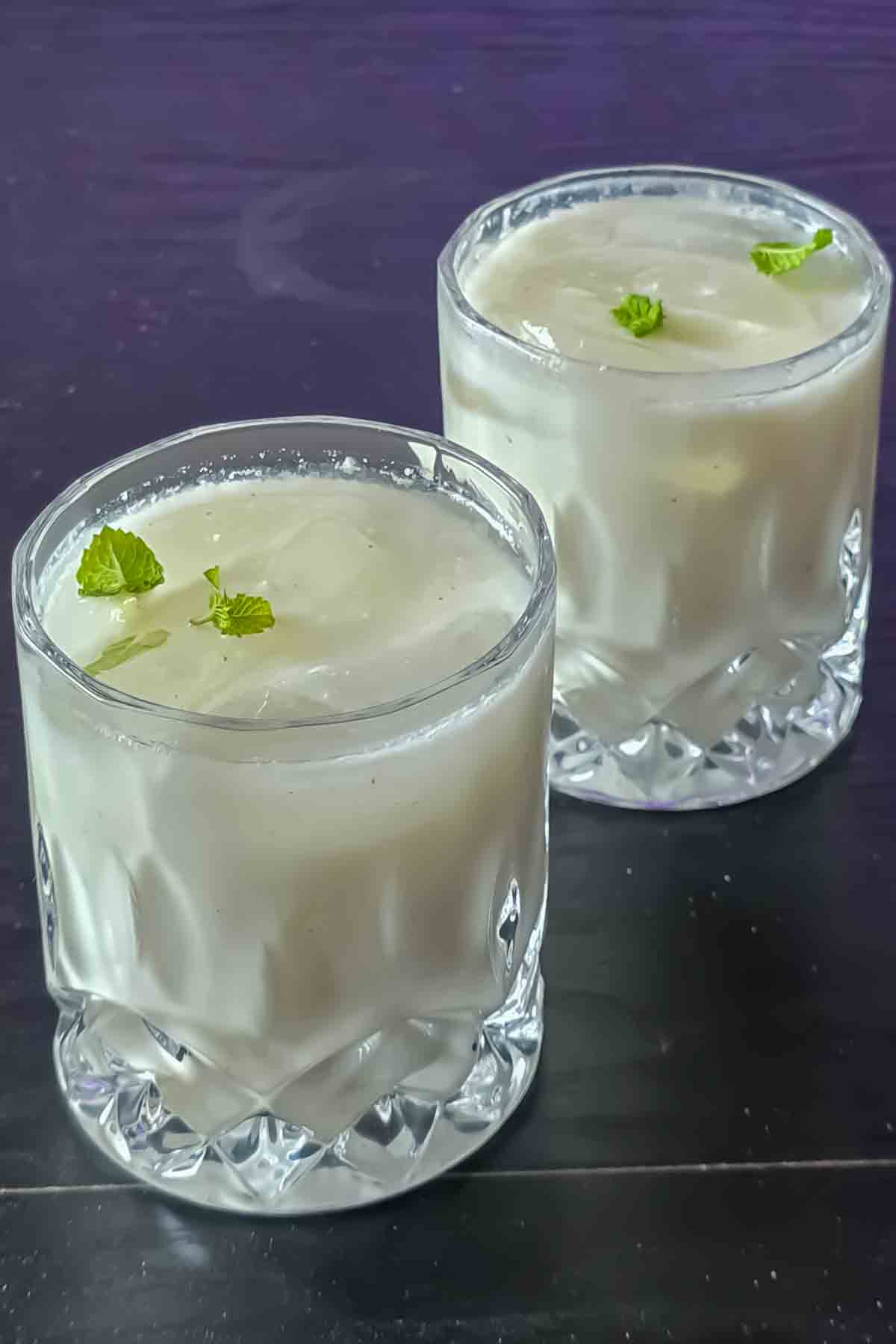 Authentic Chaas recipe made with curd (yogurt), cumin, mint, and herbs.