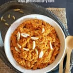 Pinterest image with text overlay for Instant Pot Gajar Halwa which is vegan carrot almond pudding.