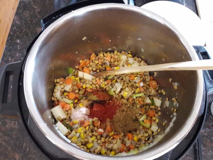 Process shot of lentil chili making in Instant Pot.