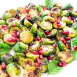 Crispy Brussel Sprouts made in air fryer or oven or by pan frying on the stove top. Served with beautiful garnishes.