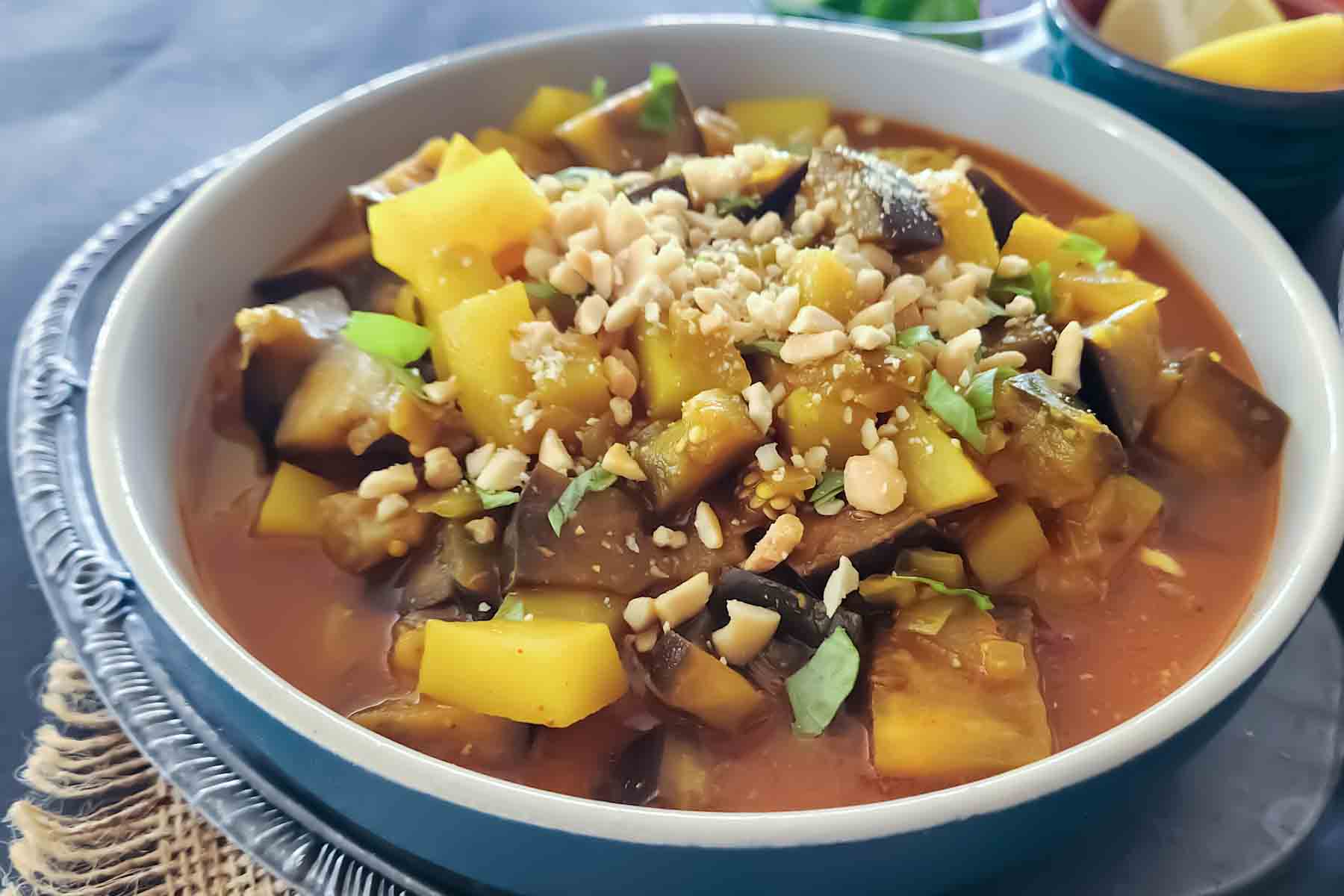 Indian Eggplant Curry, or Aloo Baingan, is an easy vegan and gluten-free curry made with eggplant, potatoes, tomatoes and Indian spices. Make it Instant Pot or stovetop.