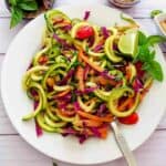 Healthy low carb Thai zucchini noodle recipe with spicy peanut sauce.