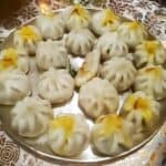 Handmade Ukadiche Modak served on Silver platter for Ganesh Prasad.