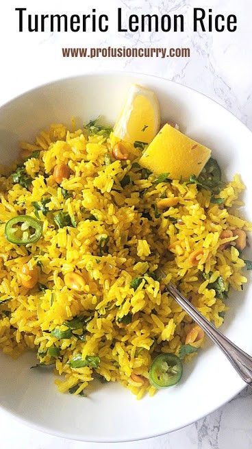 Yellow rice flavored with lemon and turmeric served in a dinner bowl. Image has text overlay.