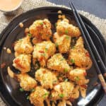 Pinterest image with text overlay for Bang Bang Cauliflower Bites made in Airfryer.