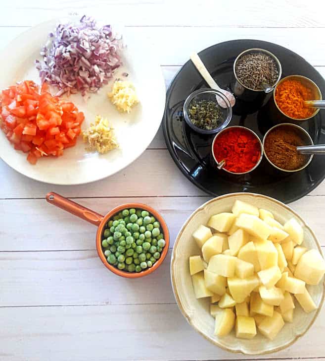 Ingredients needed to make Aloo Matar