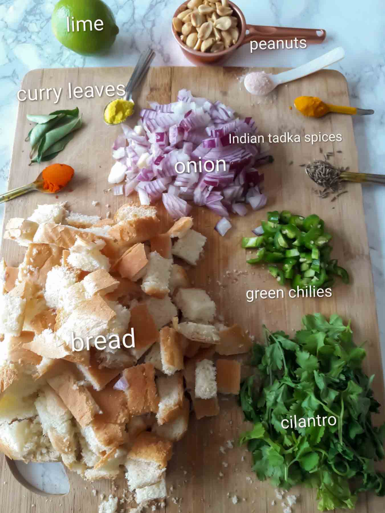 Ingredients used in making masala bread for vegan Indian breakfast bread upma recipe.