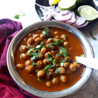 Chana Masala -Punjabi CHole-Indian Chickpea Curry in copper serving bowl