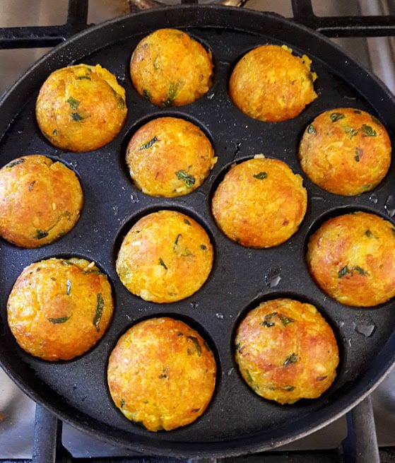 Cheesy Potato Poppers on Appe pan when turn golden brown ready to serve