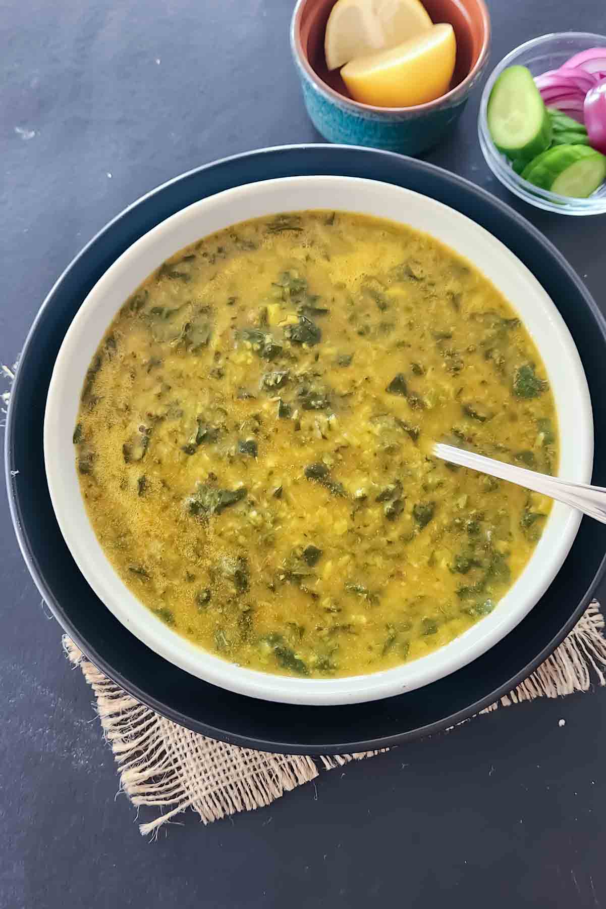 Homemade Indian Spinach Dal served with basmati rice and fresh cilantro.