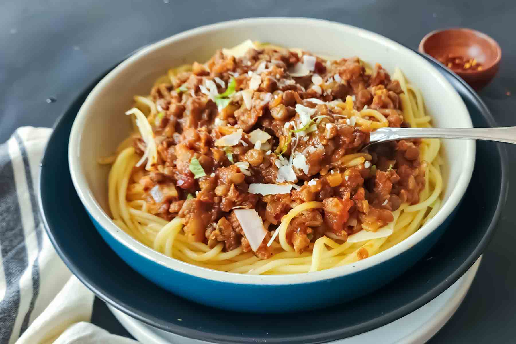 Hearty lentil Bolognese pasta for an easy weeknight dinner.