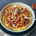Instant Pot lentil Bolognese served over spaghetti.