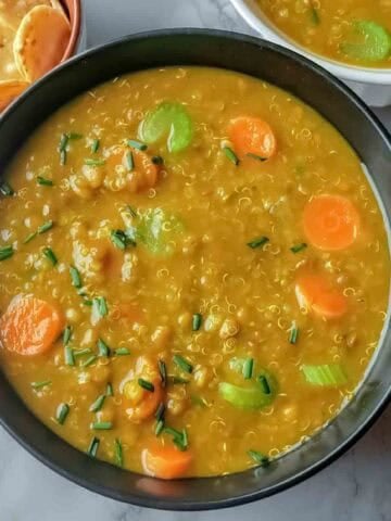 easy Instant Pot Lentil Quinoa Soup with lentils, quinoa, carrots, celery, garlic, and turmeric. A hearty one-pot soup inspired by Trader Joe’s Ancient Grains Soup.