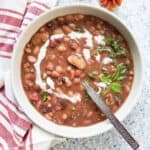 15 bean vegetable soup made in Instant Pot pressure cooker served in a bowl.