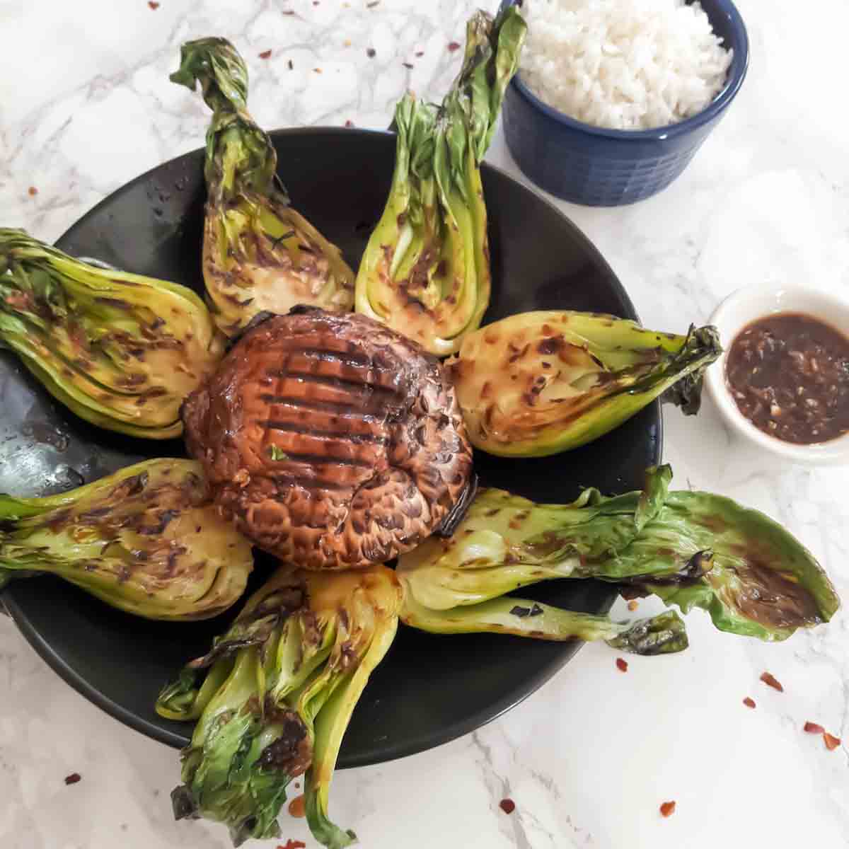 Asian grilled vegetables arranged on the platter.