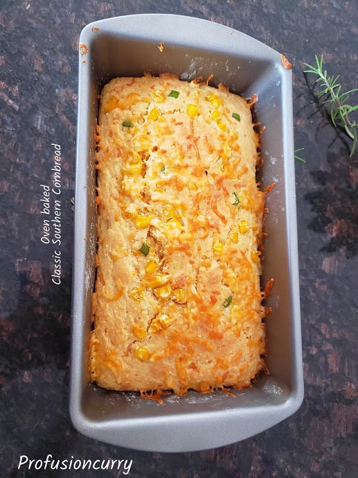 Fresh out of the oven home made cornbread with cheesy top and bits of jalapeno peppers.