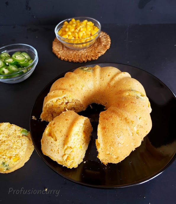 Vegan and glutenfree cornbread made in instantpot served on black platter.