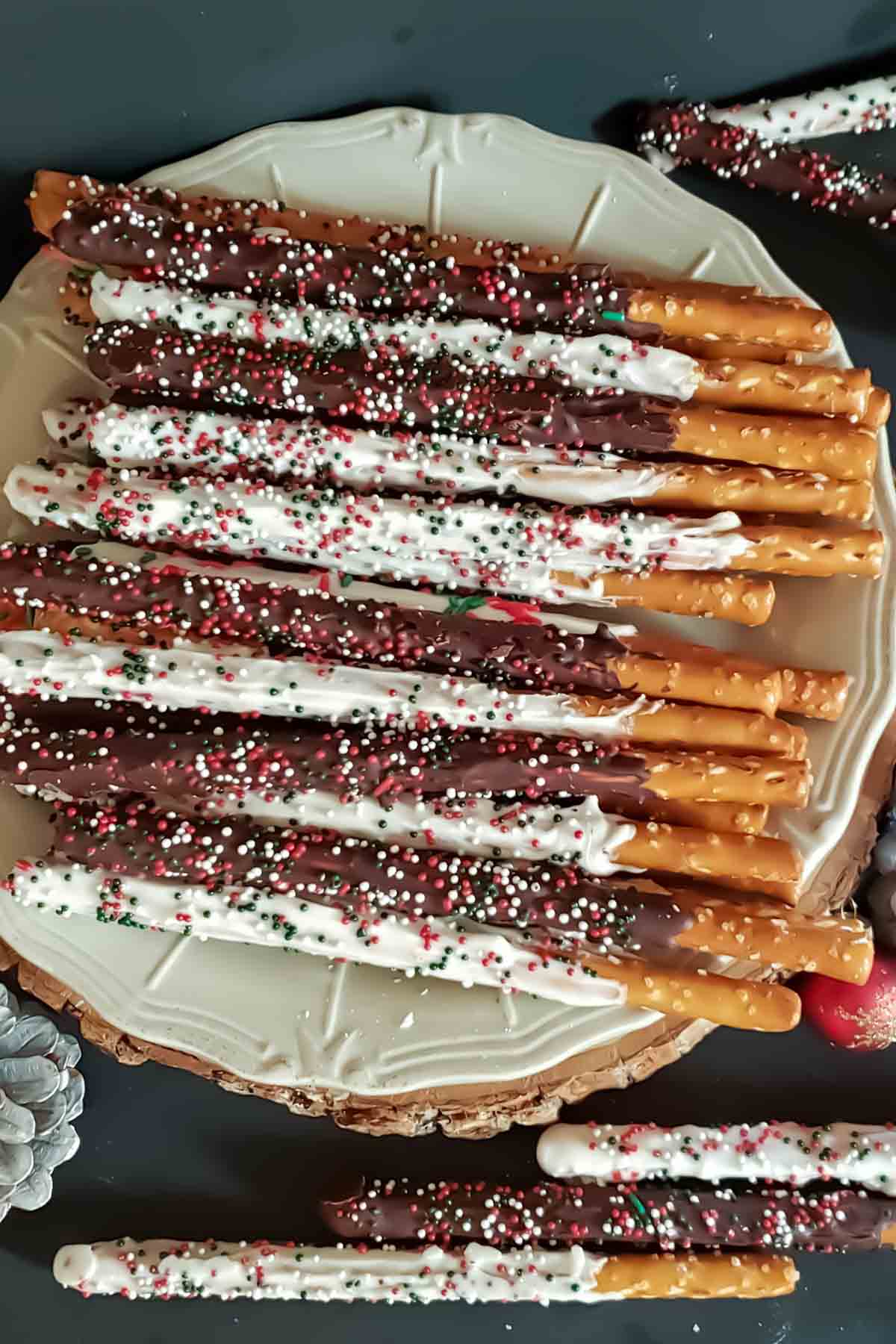 Easy Christmas no-bake dessert made with chocolate and pretzel rods.