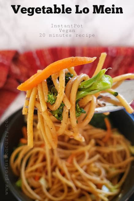 A fork holding delicious lo mein noodles and veggies. This profusioncurry Instantpot recipe makes moist and soft chinese noodles.