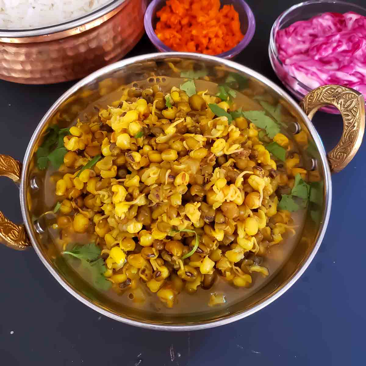 Green moong sprouts curry recipe made in Instant Pot served for wholesome vegan Indian dinner.