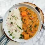 Thai Pumpkin Curry served over rice for easy one pot dinner.