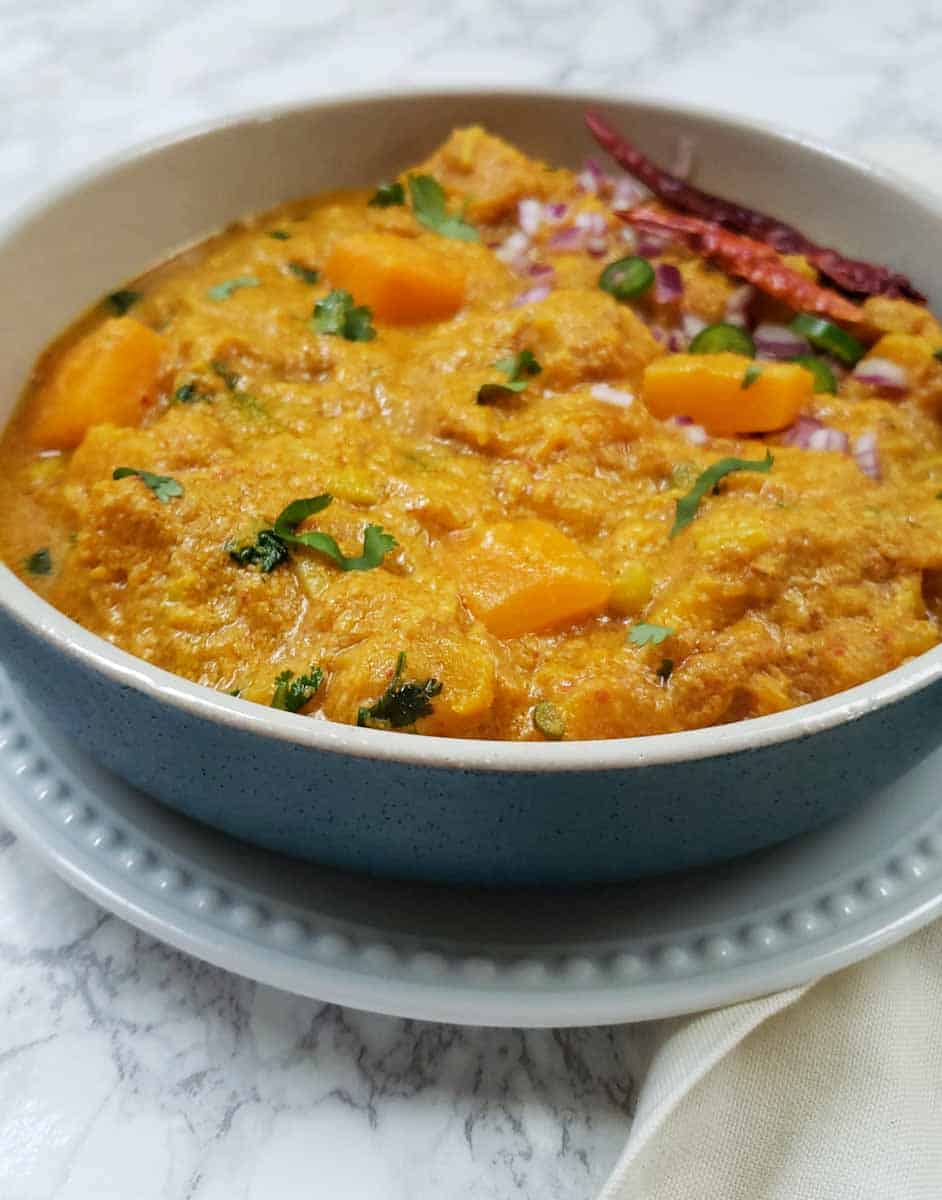 Deeply hued turmeric and curry infused pumpkin curry. 