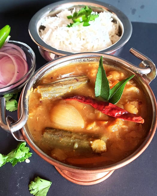 Showing the close up view of vegetable Sambar . This thick and delicious stew pairs well with steamed rice.