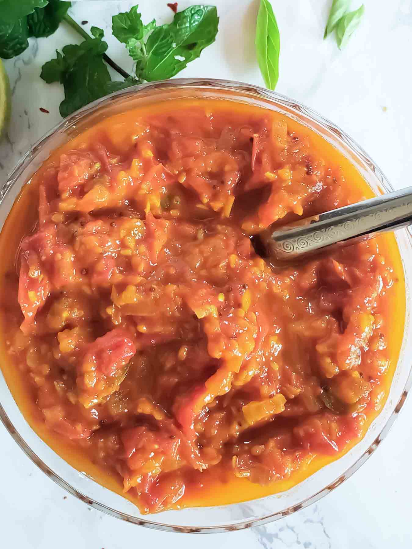Spicy red and sweet cherry tomato chutney uses garden fresh produce.