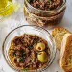 olive tapenade recipe made with sun dried tomatoes. This vegan olive tapenade without anchovies makes excellent gourmet appetizer spread.