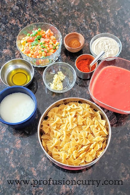 Display of ingredients to make Indian Italian cremay pasta