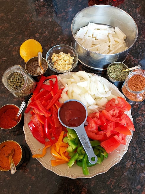 Ingredient displayed to make Indian spiced paneer and vegetable stirfry.