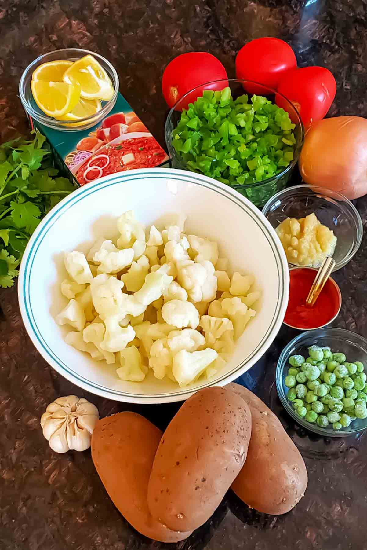 Mumbai style Pav Bhaji recipe Ingredients including mixed vegetables and pav bhaji masala.