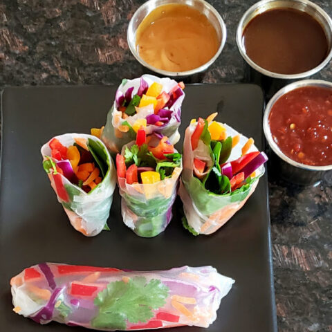 Fresh Vegetable Vietnamese Spring Rolls are served along with different dipping sauces. This delicious and beautiful Profusioncurry recipe is a must for summer and spring lunches.