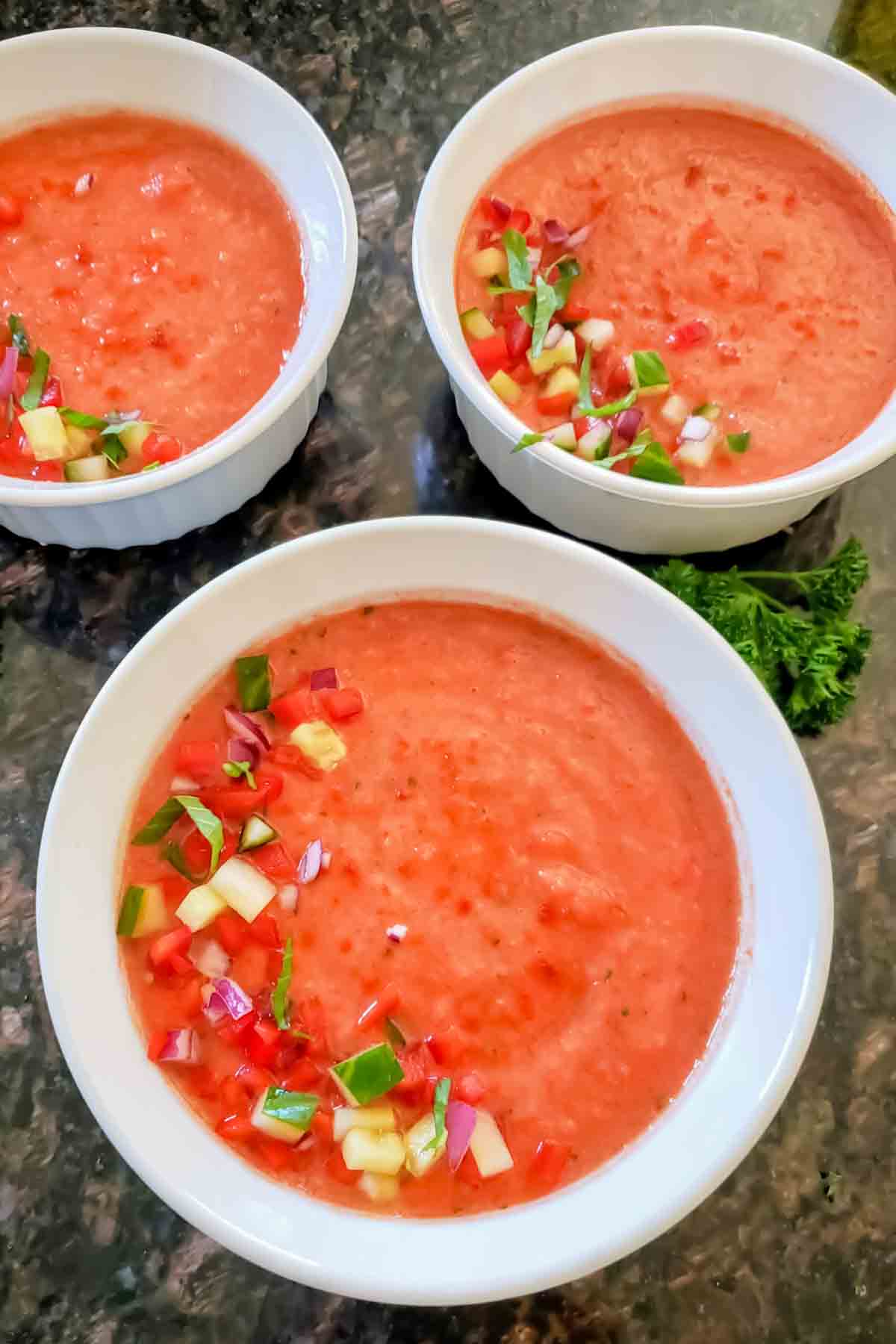 Homemade vegan gazpacho recipe served for light summer meal.