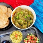 Easy Gujrati Undhiyu served with fried puri and salad.