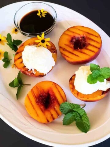 Fresh peaches grilled and drizzled with balsamic glaze.