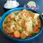 Rich and earthy Vegan Massaman Curry made in one pot served for dinner along with rice.