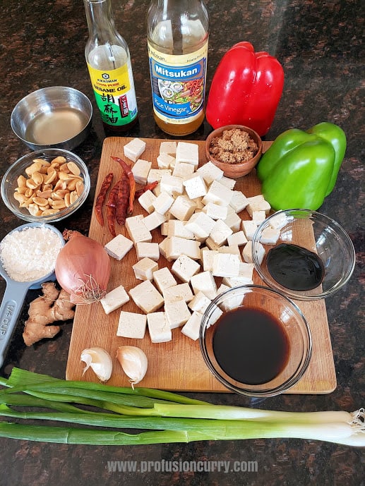 Ingredients used in the recipe displayed on black counter.