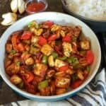 Homemade Kung Pao tofu stir fry with crispy tofu and colorful vegetables.