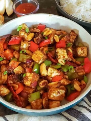 Homemade Kung Pao tofu stir fry with crispy tofu and colorful vegetables.