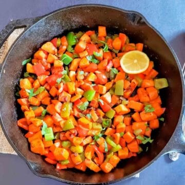 Healthy vegan sweet potato stir fry recipe with colorful vegetables and spices.