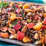 Wild Rice Pilaf stuffing along with apples, orages, walnuts and herbs served at holiday dinner.