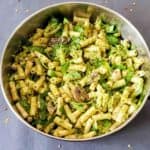 Pasta primavera with pesto, mushrooms and other vegetables.