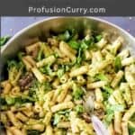Overhead shot of pesto pasta primavera with colorful spring vegetables