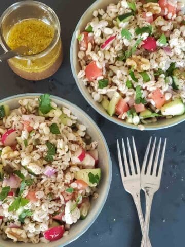Delicious barley salad recipe served in bowls.