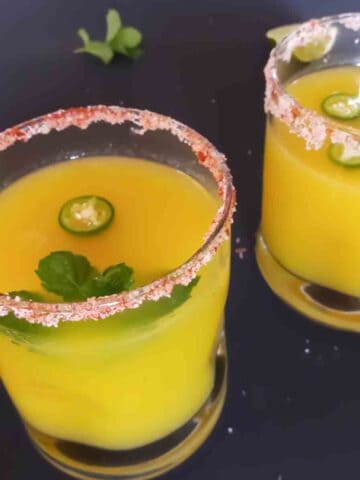 Aam Panna which is Indian mango mocktail is refreshing drink made with mango. It is served chilled as thirst quencher.